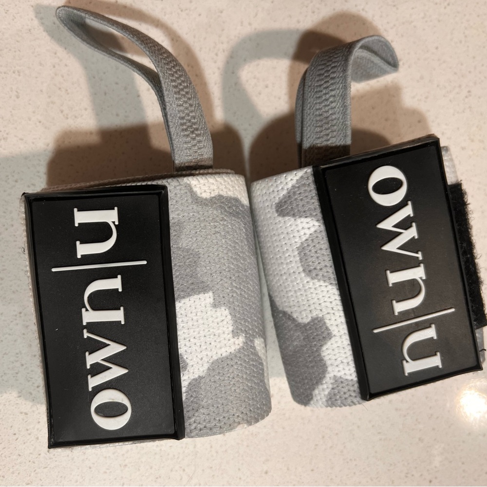 Women’s wrist wraps, New never used.